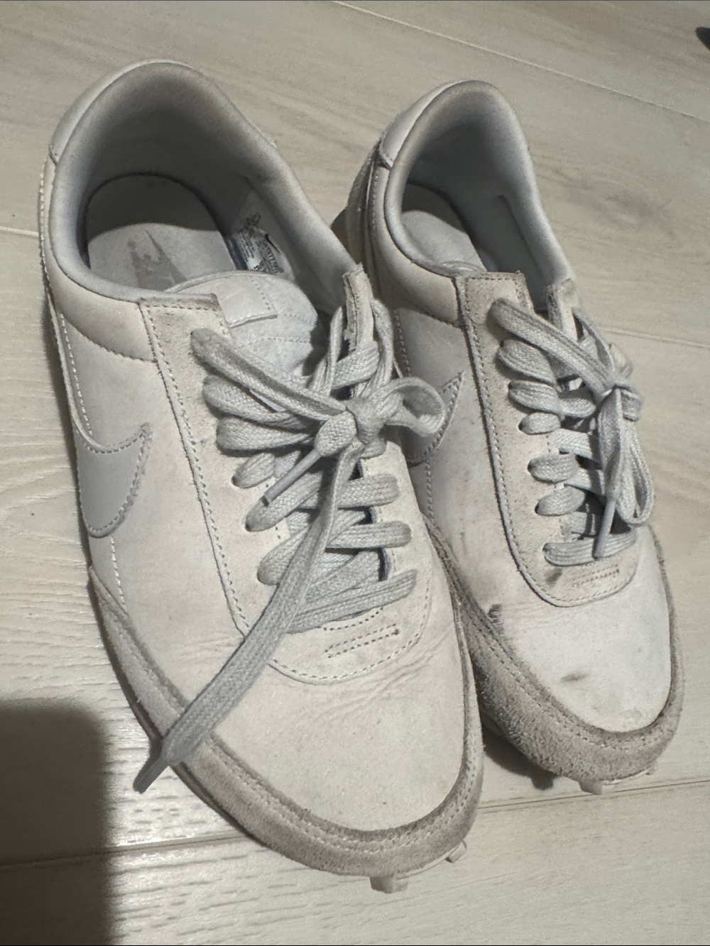 Nike Woman’s White Suede Low-Top Sneakers